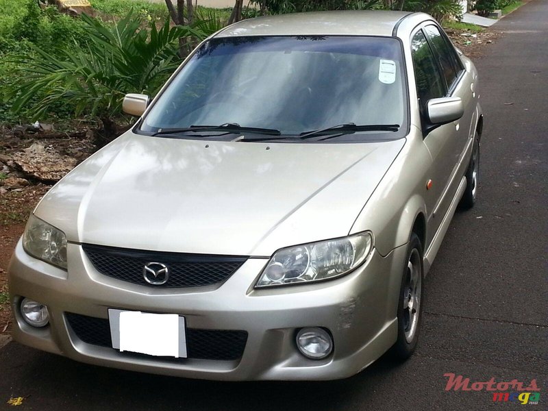 2003' Mazda 323 photo #1