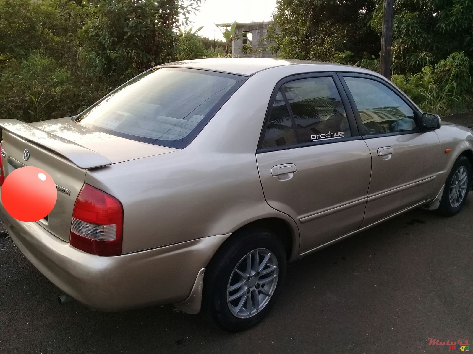 2000' Mazda 323 photo #2