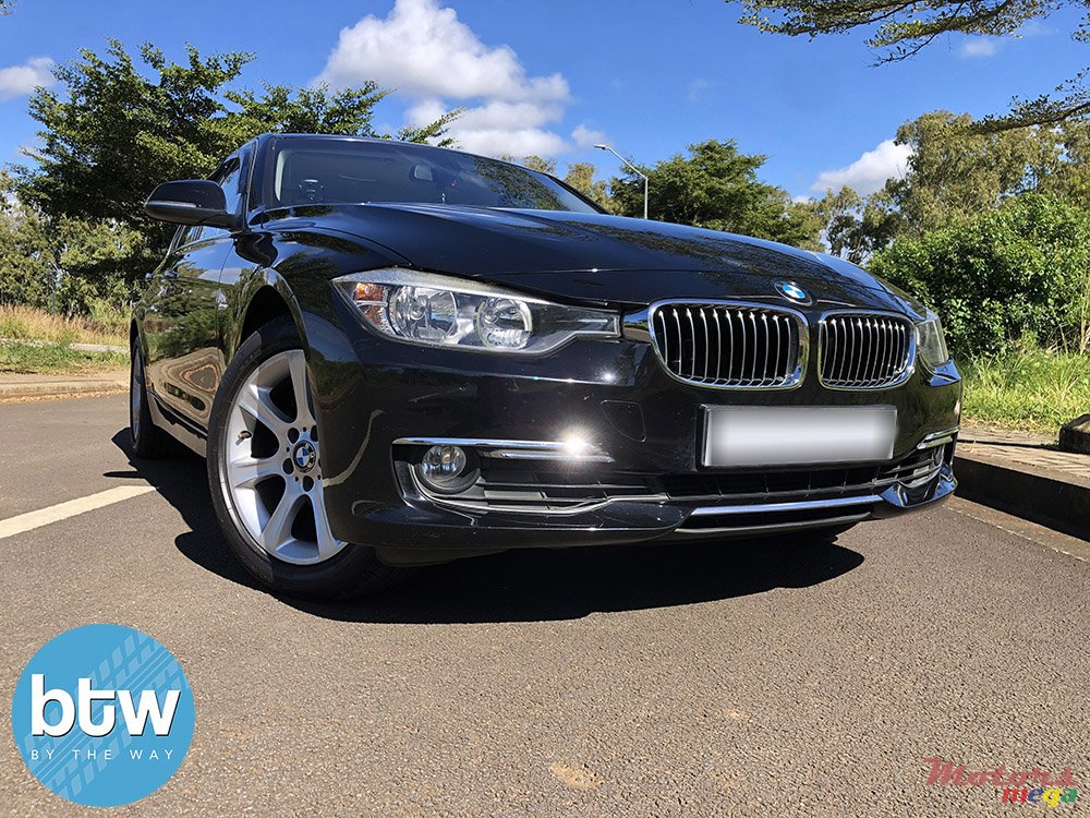 2012' BMW 320 photo #1