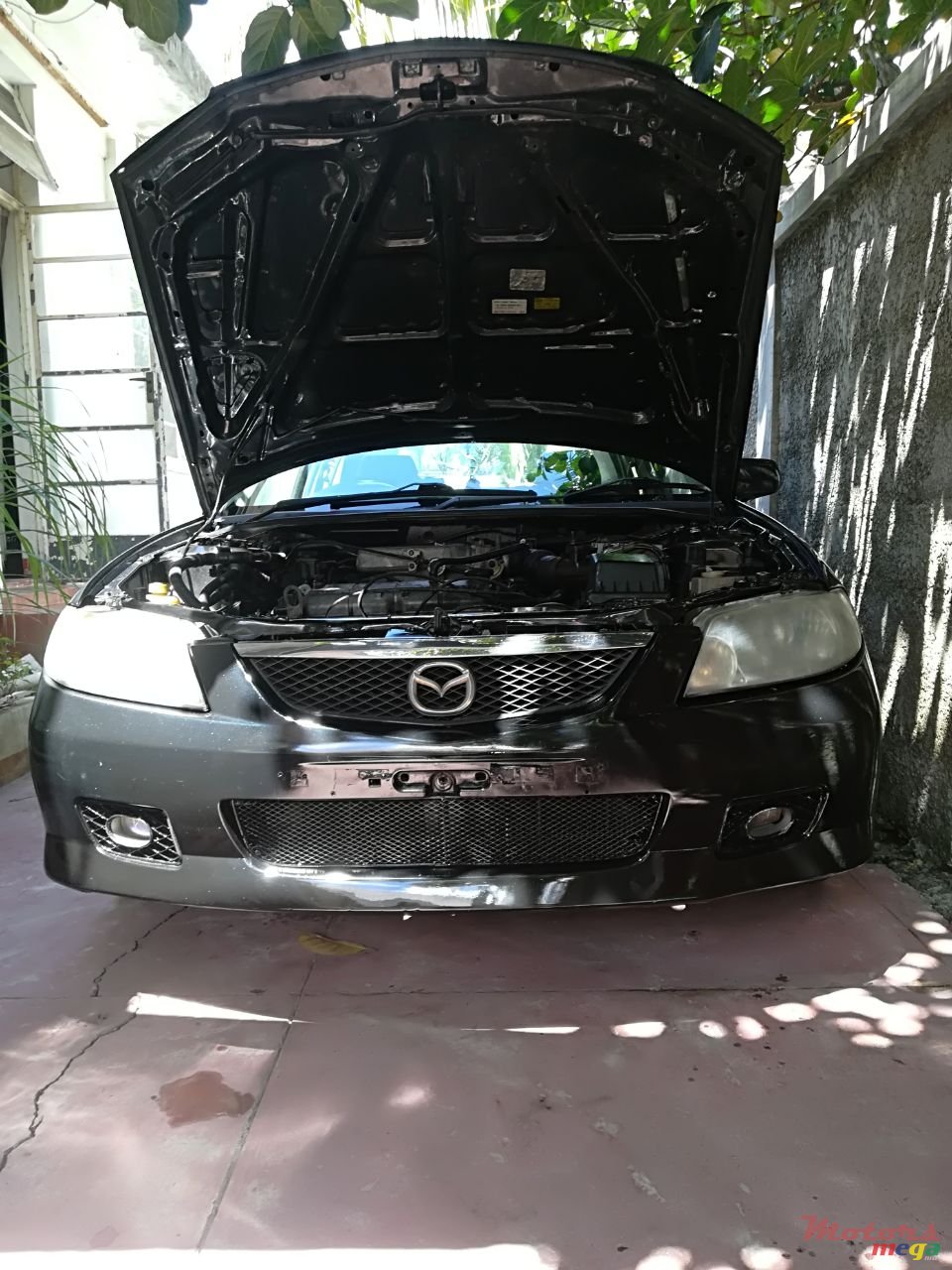 1999' Mazda 323 photo #3