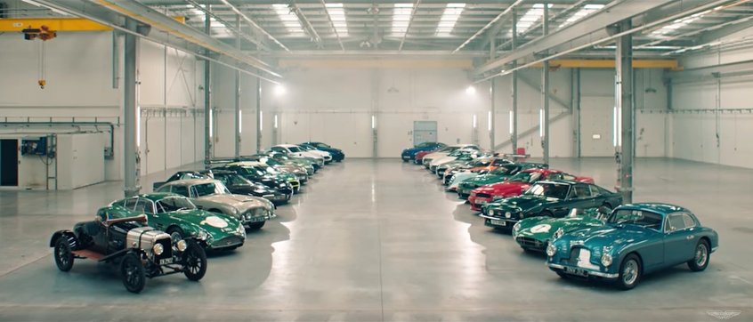 Watch $80M worth of Aston Martins tear around new factory