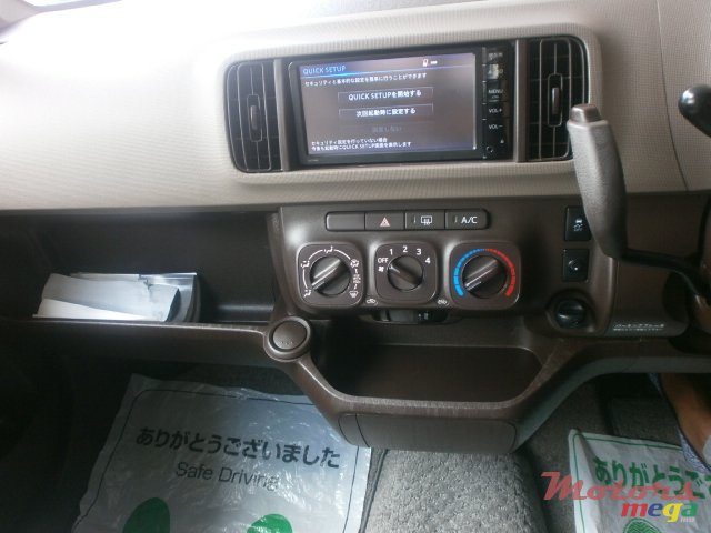 2015' Toyota Paseo passo photo #2