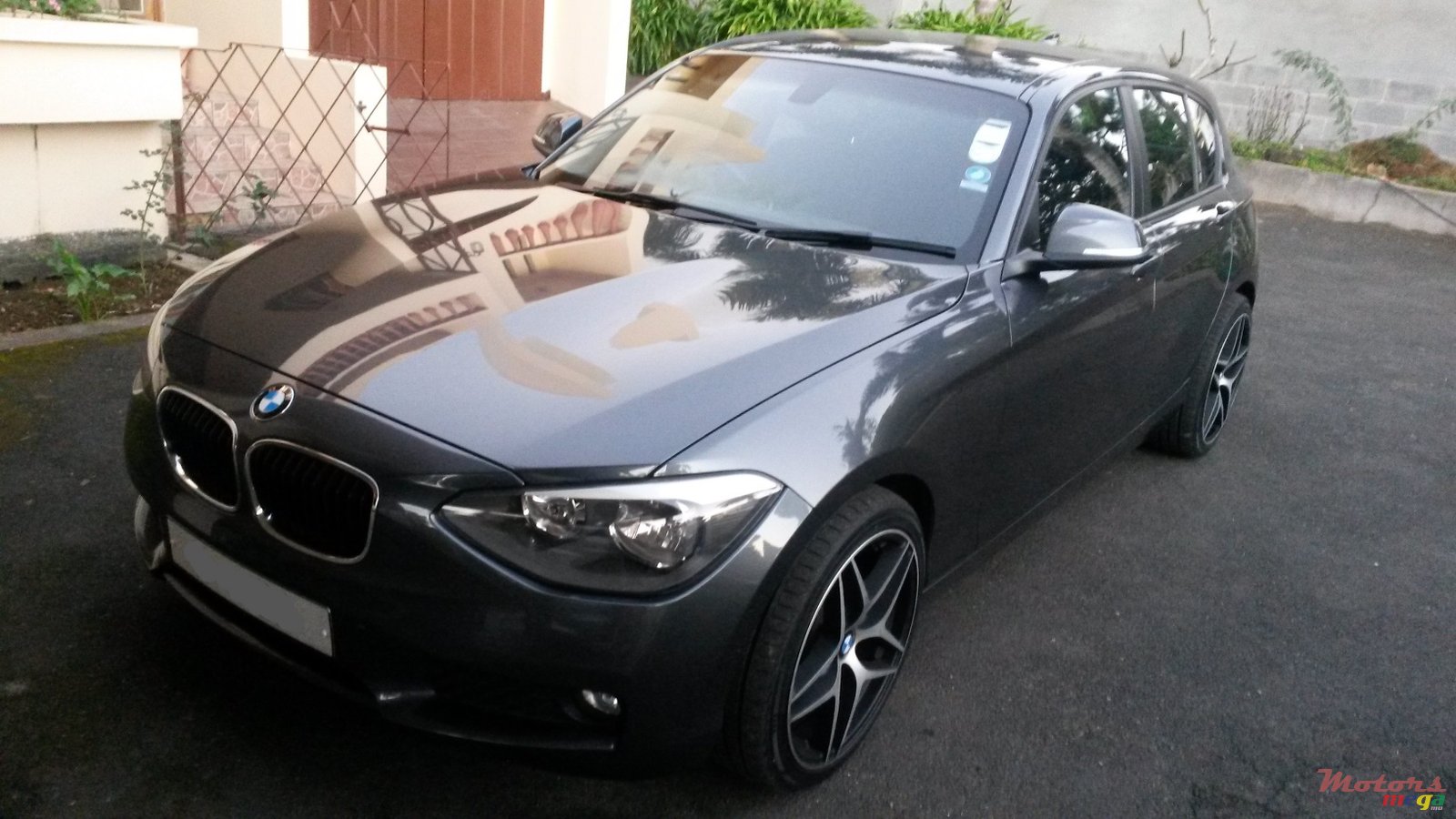 2011' BMW 116 photo #1