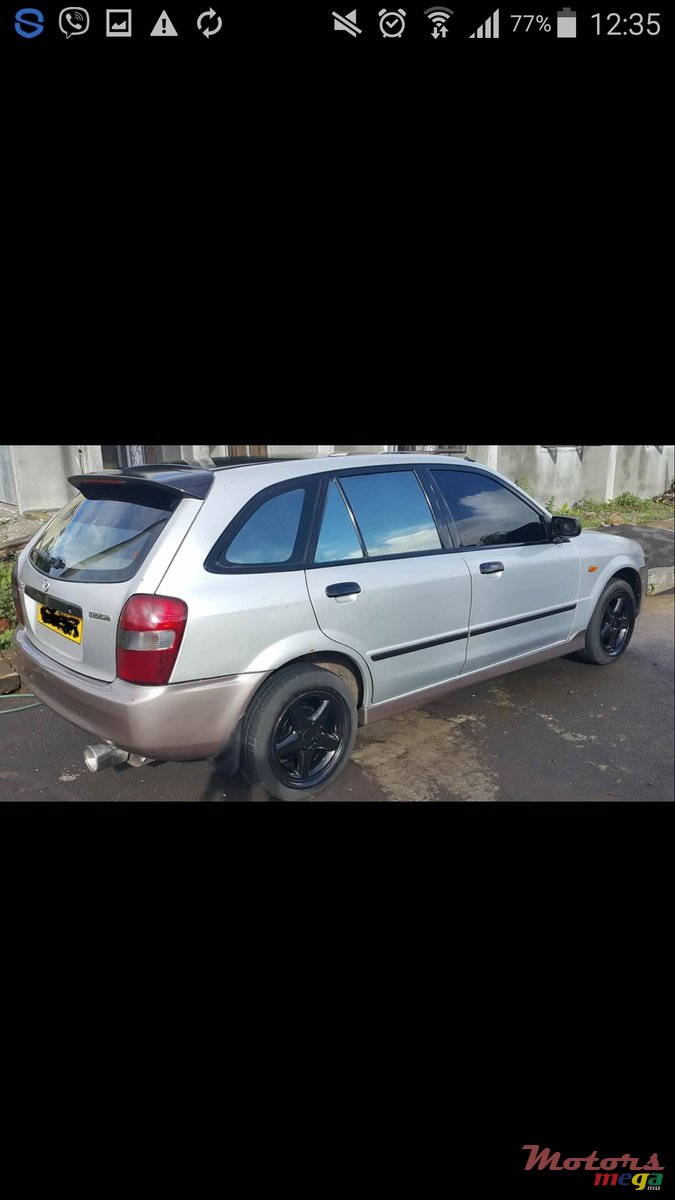 1999' Mazda 323 photo #1