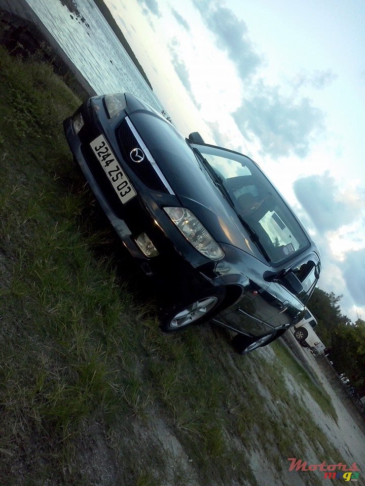 2003' Mazda jante cosmic photo #1