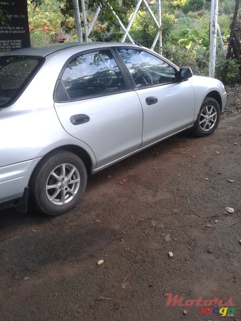 1998' Mazda 323 moteur toyota 4efe photo #1