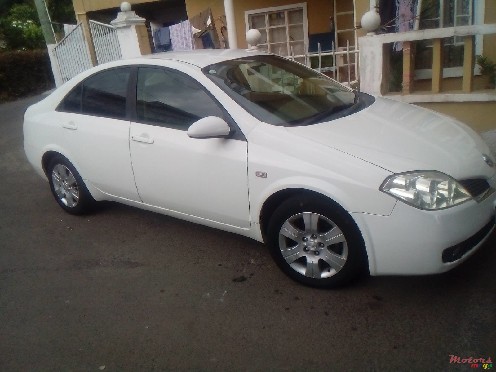 2006' Nissan Primera photo #1