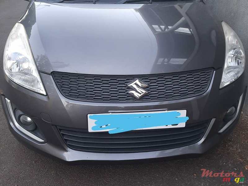 2015' Suzuki Swift photo #1