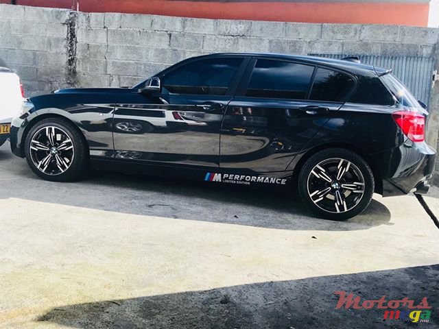 2012' BMW 116 photo #5