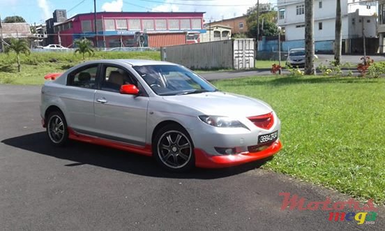 2004' Mazda 3 photo #1