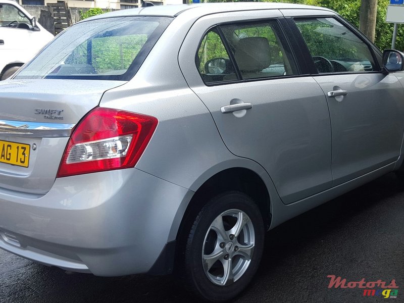 2013' Suzuki Swift Dzire sedan photo #1