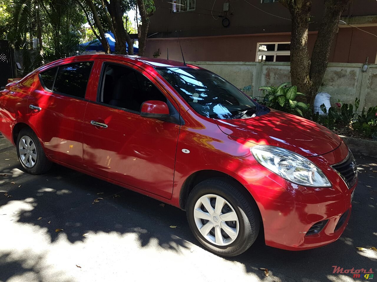 2013' Nissan Almera Saloon photo #1