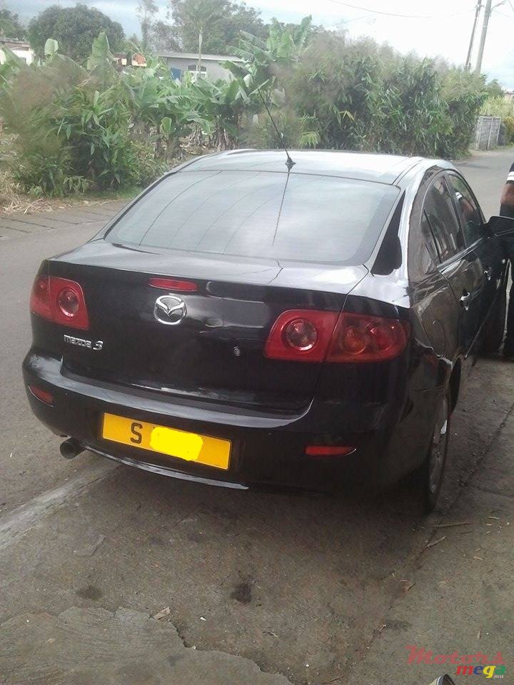 2004' Mazda Mazda3 photo #1