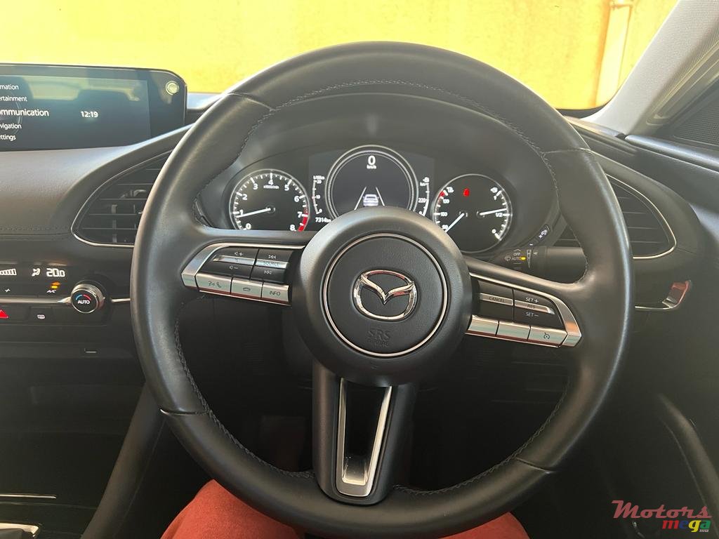 2023' Mazda 3 photo #2