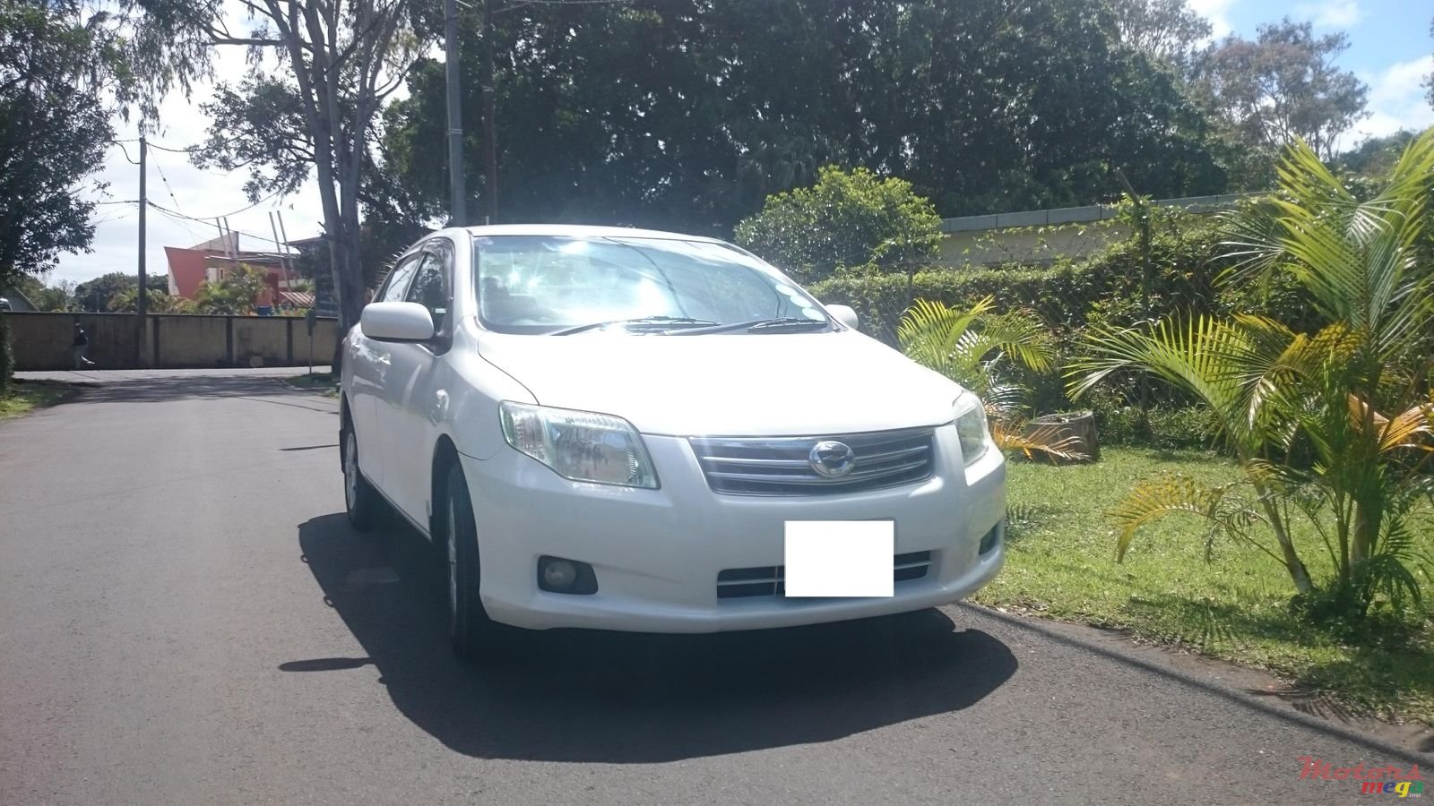 2009' Toyota Corolla Axio photo #1