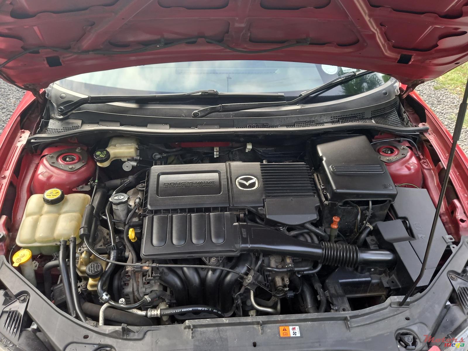 2004' Mazda 3 photo #1