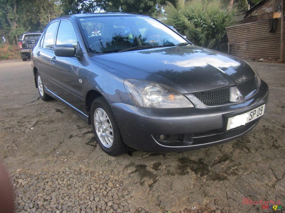 2009' Mitsubishi Lancer GLX LUXURY photo #1