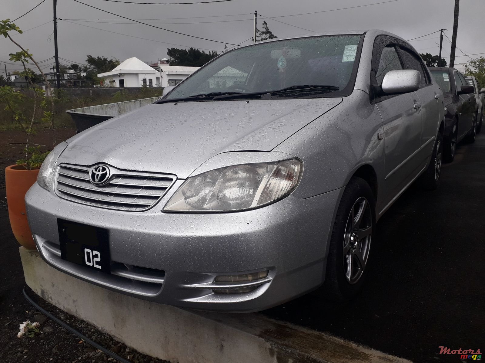 2002' Toyota Corolla NZE auto photo #2