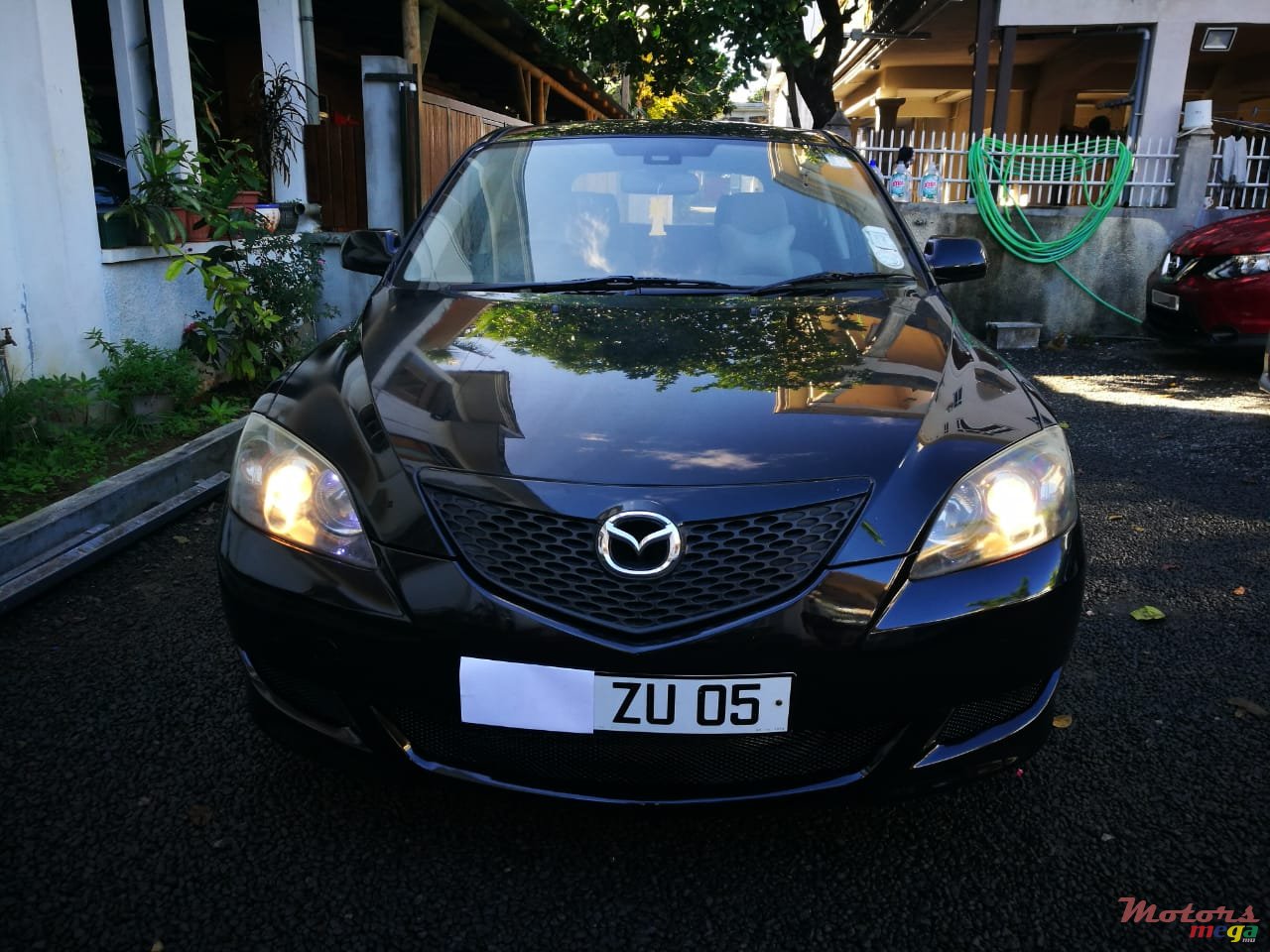 2005' Mazda 3 photo #1