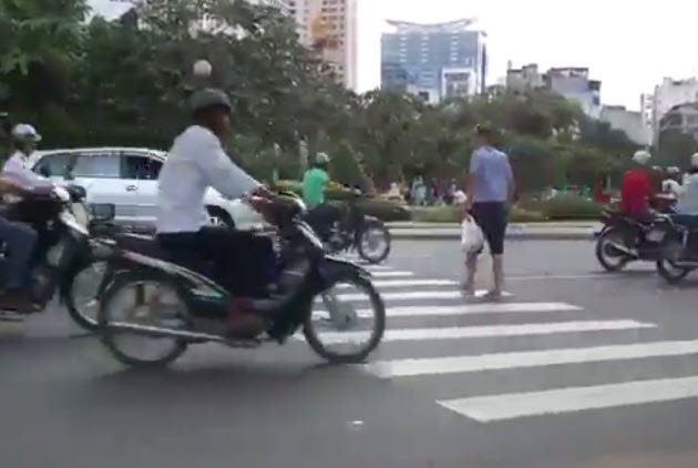 How to successfully cross the road in Vietnam