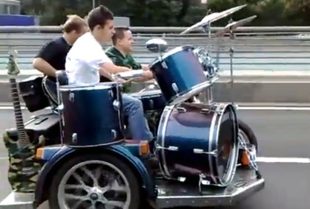 Band on the run rocks Russia's freeways with crazy motorcycle
