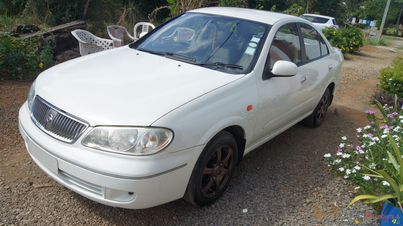 2004' Nissan Sunny photo #1