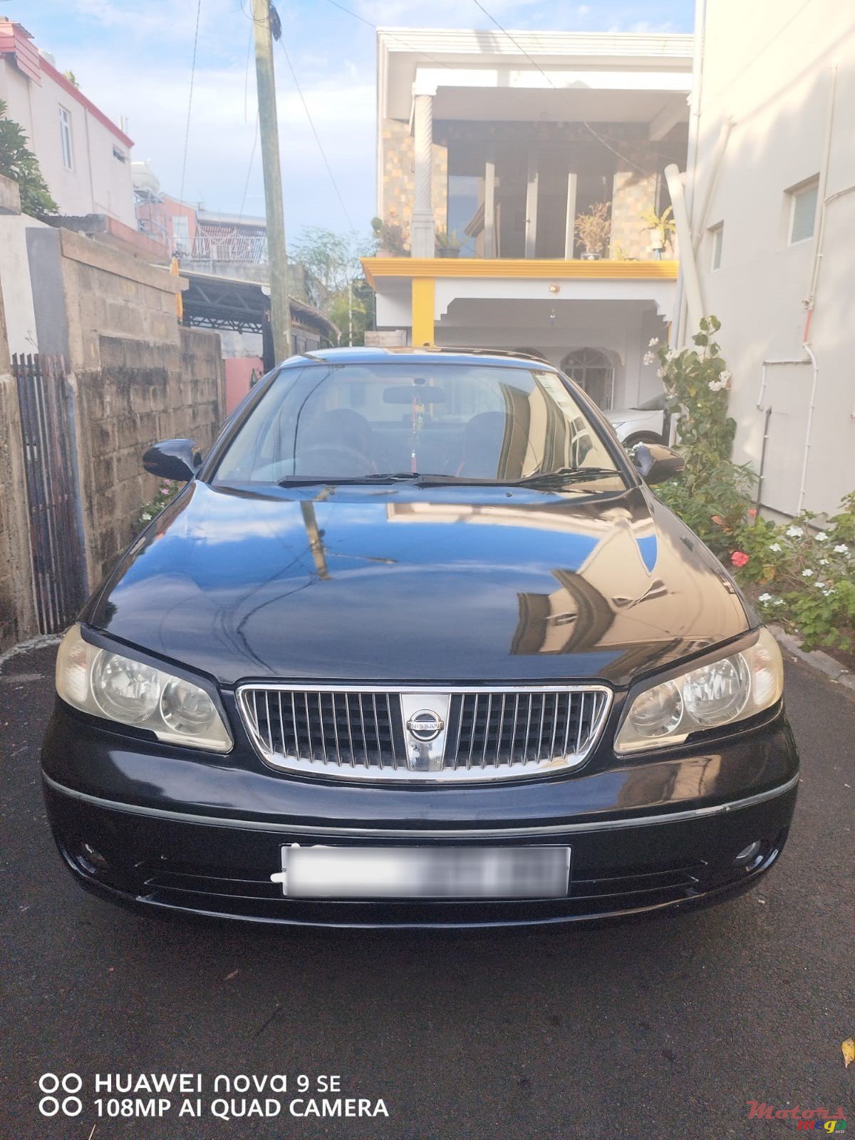 2005' Nissan Sunny photo #1