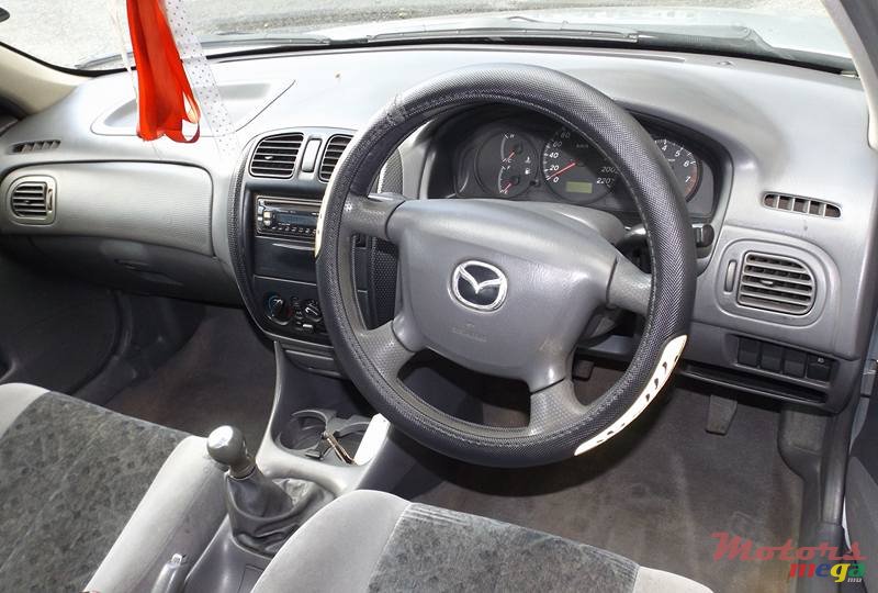 2000' Mazda 323 photo #5