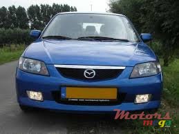 2003' Mazda 323 photo #1