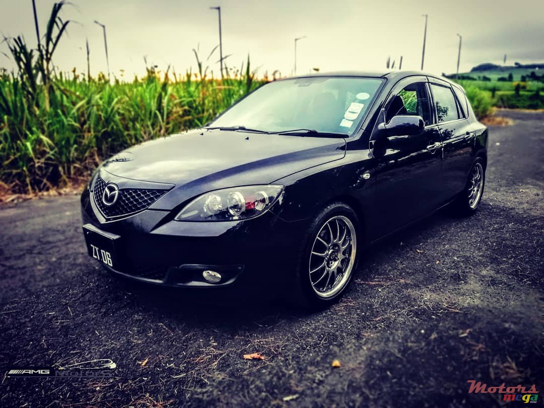 2006' Mazda Axela 1.5 Japan photo #2