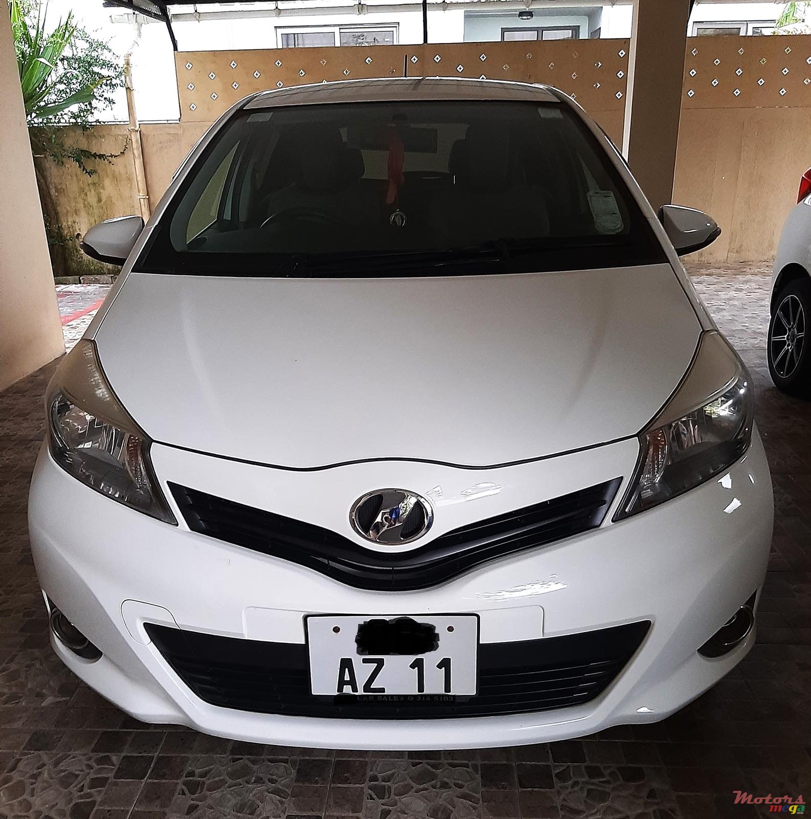 2011' Toyota Vitz photo #1