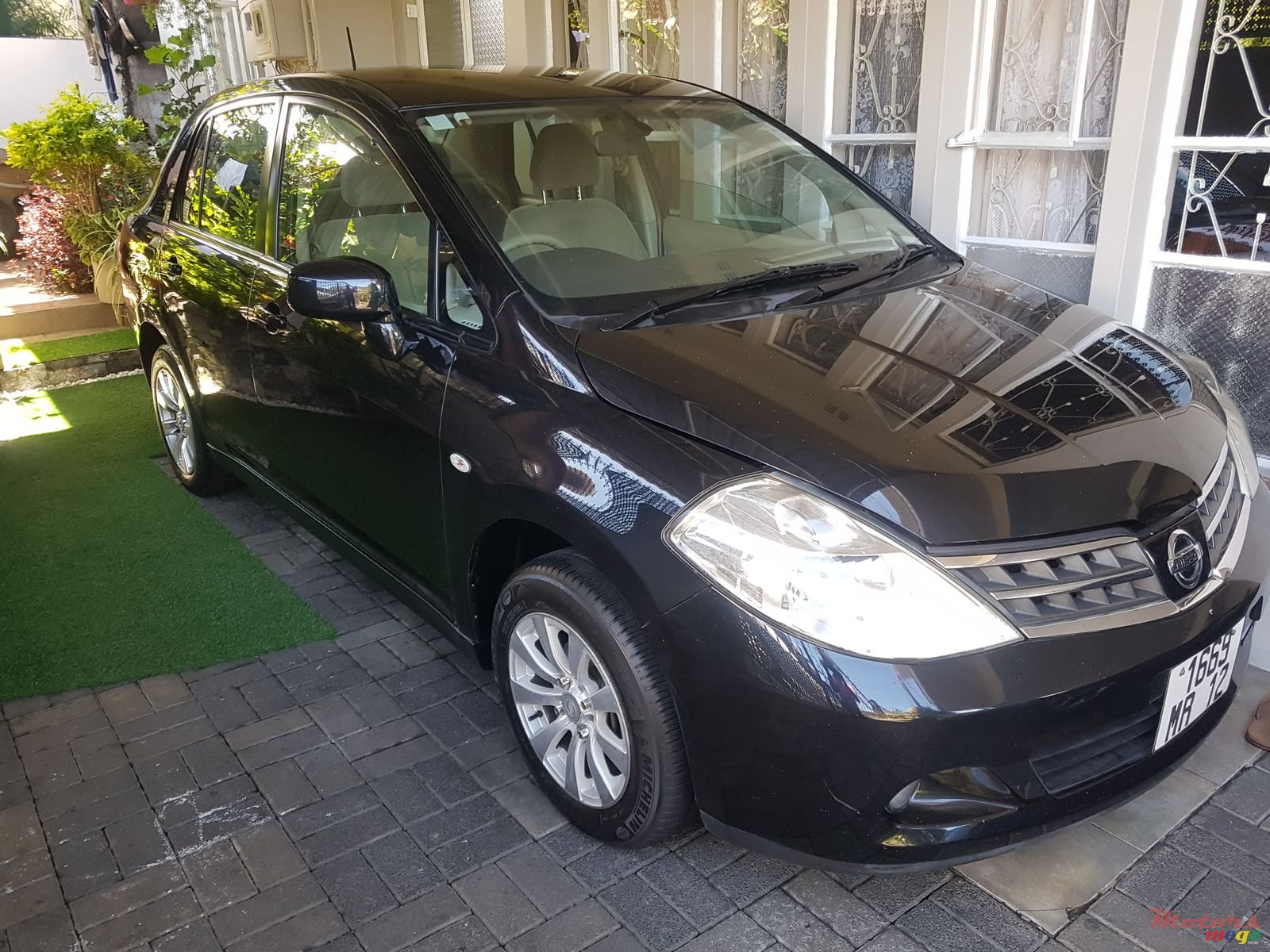 2012' Nissan Tiida photo #1