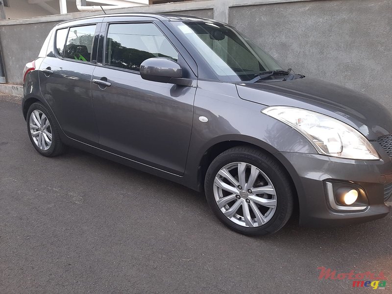 2015' Suzuki Swift photo #6