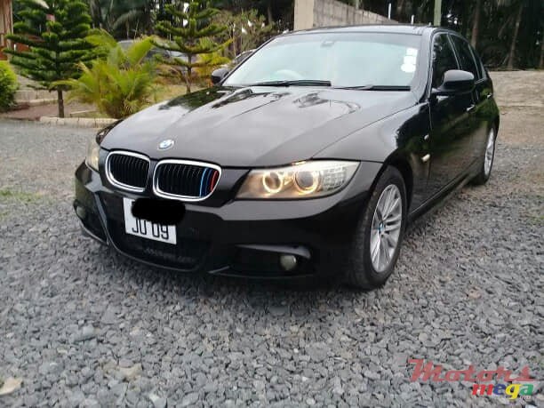2009' BMW 320 photo #1
