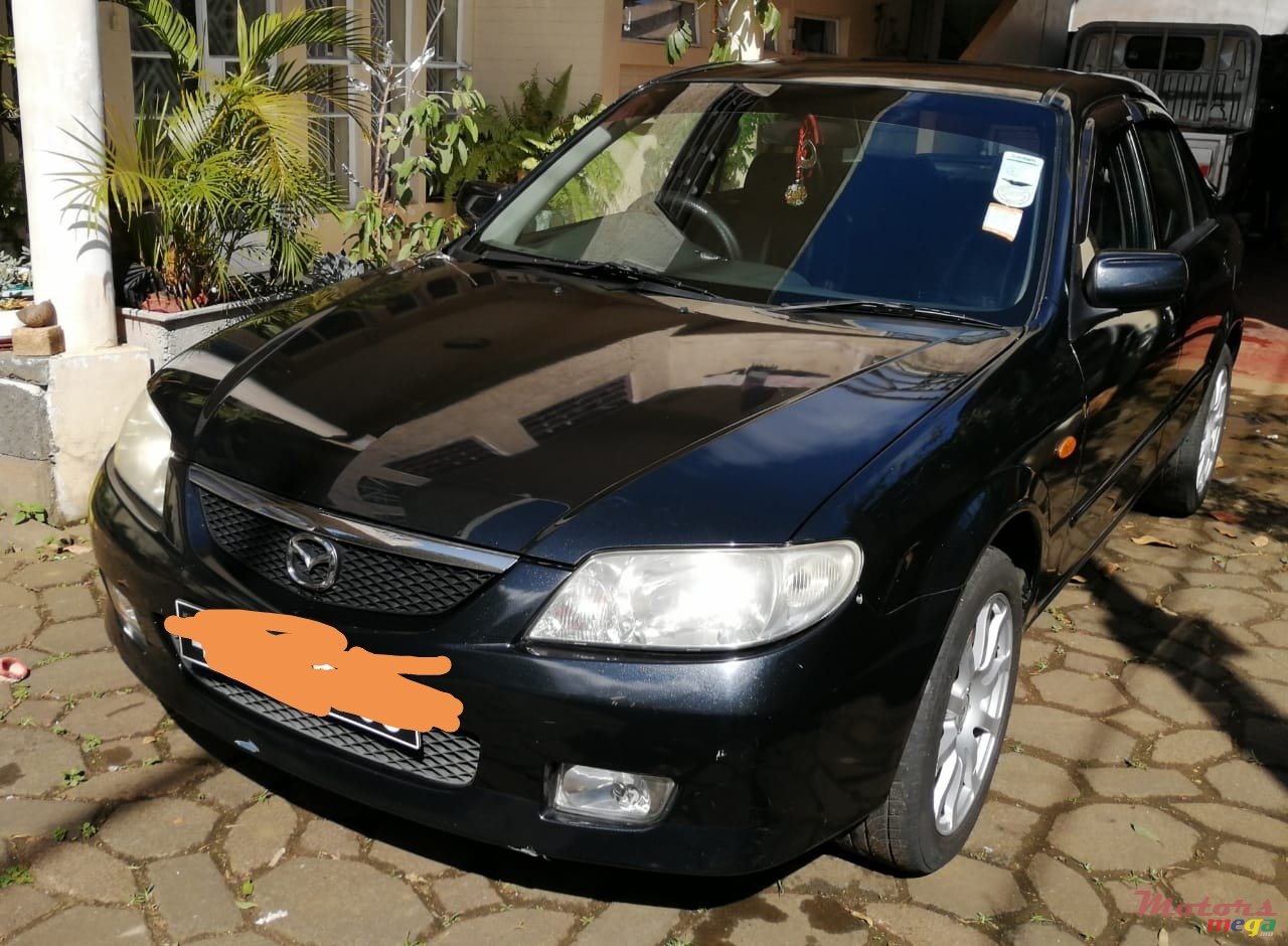 2003' Mazda 323 photo #6