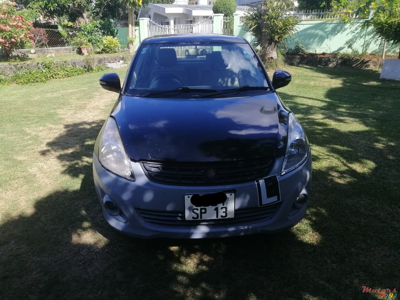 2013' Suzuki Swift Dzire photo #2