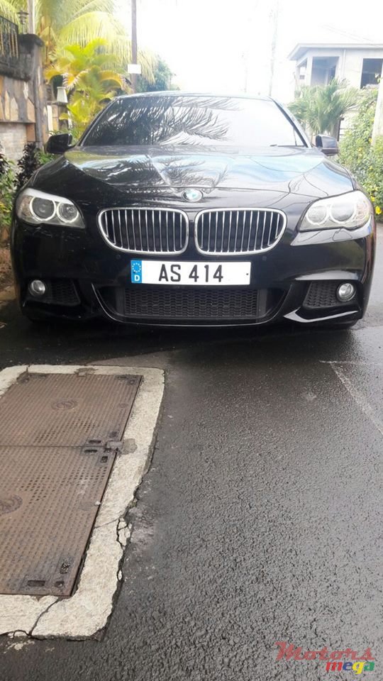 2012' BMW 520 photo #7