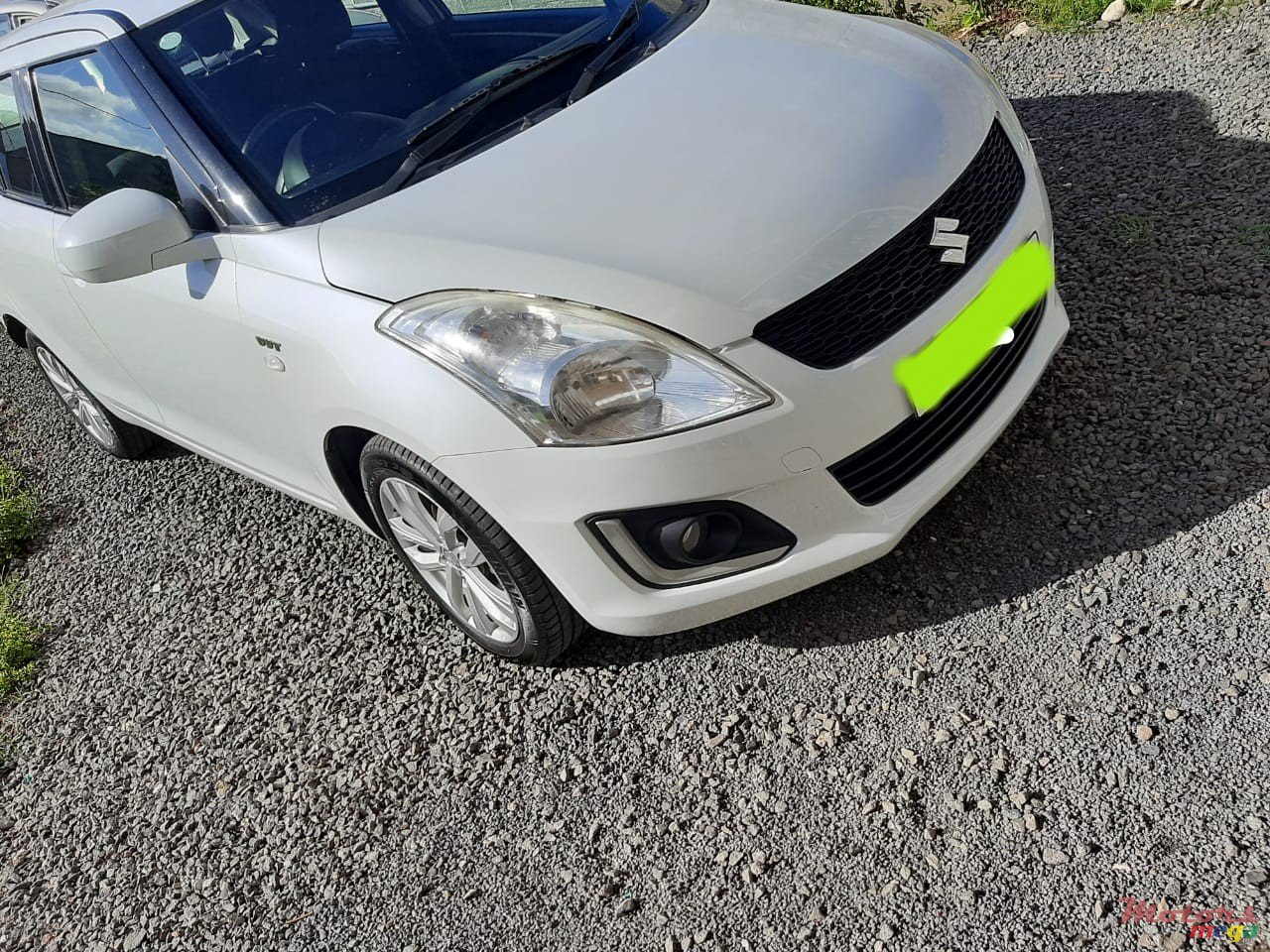 2015' Suzuki Swift photo #1