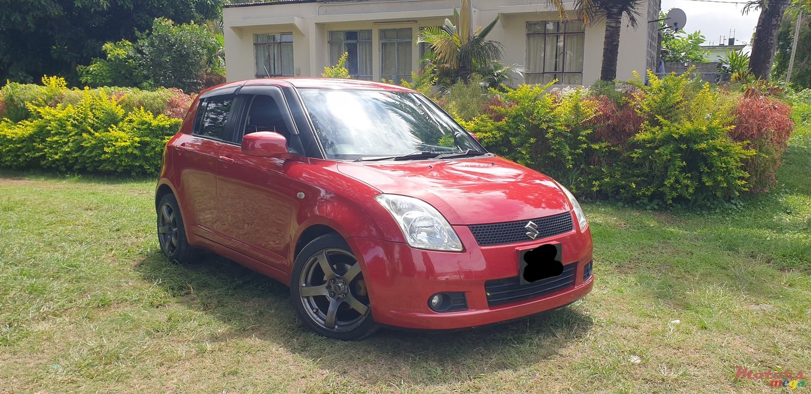 2005' Suzuki Swift 1.5 DOHC photo #1