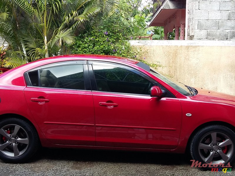 2004' Mazda 3 photo #1