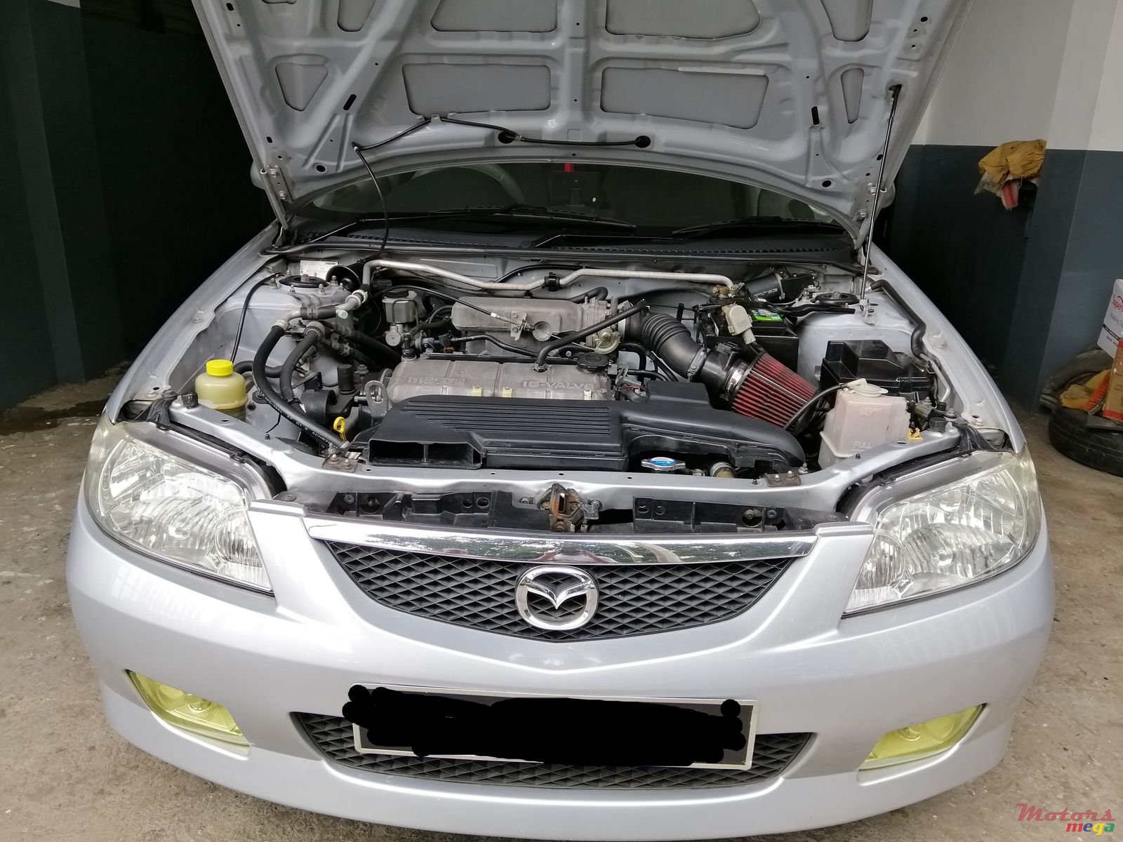 2002' Mazda 323 photo #2