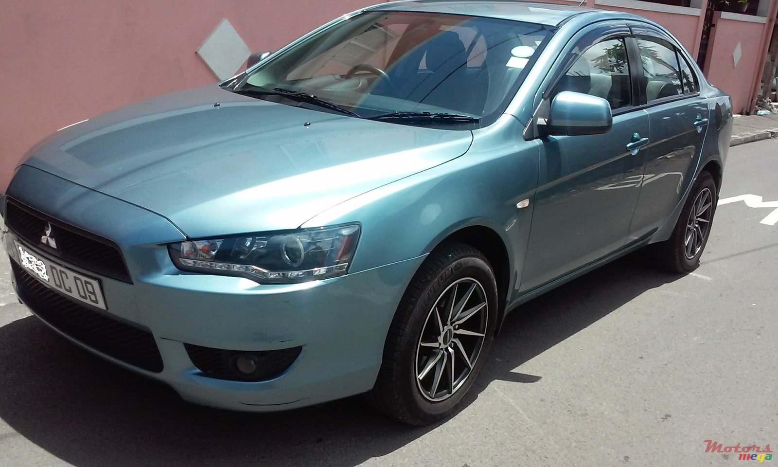 2009' Mitsubishi LANCER EX photo #1